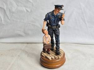lot 374 image: Blue Hats or Bravery Police Musical Figurine
