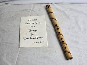 lot 378 image: Handcrafted Bamboo Flute with Instructional Booklet