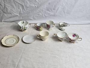 lot 380 image: Floral Tea Cups and Saucers with Gold Trim