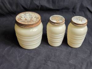 lot 394 image: Salt and Pepper Shakers and a 5 Tall Small Storage Jar