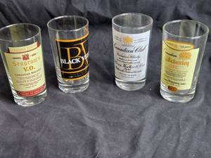 lot 406 image: Set of 4 Vintage Canadian Whisky Glasses - Seagrams, Black Velvet, Canadian Club, Schenley