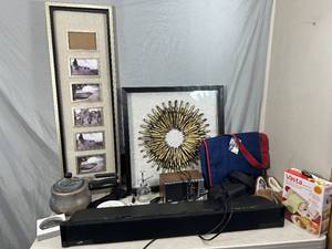 lot 68 image: Wall Decor, Sound Bar, New Messenger Bag, Moccasins, Electronics, and More