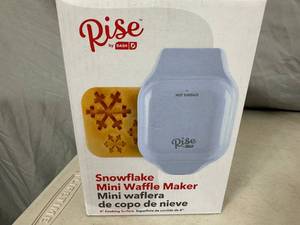 lot 136 image: New Dash Snowflake Mini Waffle Maker