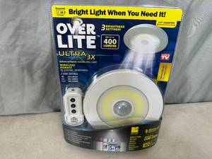 lot 155 image: New Over Lite Remote Controlled  Motion Activated Light Fixture