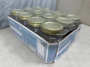 lot 215 image: 12 New Anchor Hocking Canning Jars - 1 pint Regular Mouth