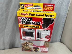 lot 235 image: New Pack of 18 Ruby Space Triangles For Closet Organization