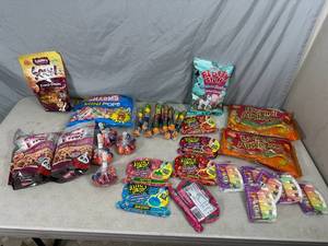 lot 376 image: Assorted Candy, Caramel Apple Suckers, Cotton Candy, Juicy Gummies, Nik-L-Nip, Pho Soups, and More