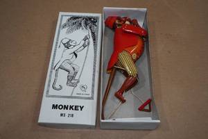 lot 105 image: Vintage Look Tin Litho Climbing Monkey