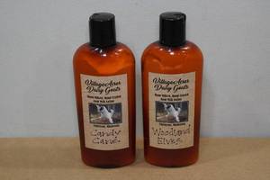 lot 116 image: 2 Bottles Goat Milk Lotion -Candy Cane & Woodland Elves