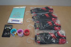 lot 259 image: Rock by Junk Food Novelty Socks, Slap Bracelets and Earrings