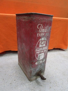 lot 234 image: Vintage United Farm Boy Bulk Oil Can