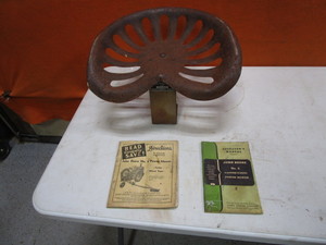 lot 274 image: Vintage Implement Seat & John Deere Manuals
