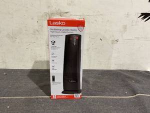 lot 124 image: Lasko 22 1500W Oscillating Ceramic Tower Space Heater with Remote