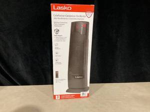 lot 415 image: Lasko 22 1500W Oscillating Ceramic Tower Space Heater with Remote