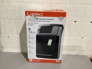lot 517 image: Lasko 1500W Cyclonic Ceramic Console Electric Space Heater with Timer
