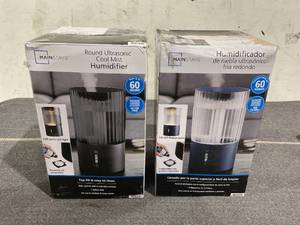lot 157 image: LOT OF 2 Mainstays Round Ultrasonic Cool Mist Top Fill Humidifier with Aroma