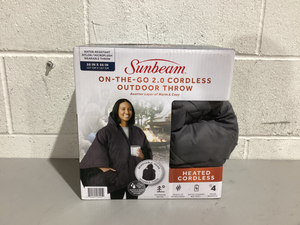 lot 594 image: Sunbeam On-The-Go Outdoor Throw Charcoal Nylon Microplush, 4 Heat Settings, Cordless Heated Blanket, 50 x 60
