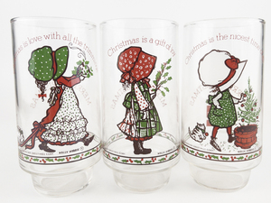 lot 34 image: HOLLY HOBBIE Set of 3 COCA-COLA &nbspLimited Edition Christmas Glasses