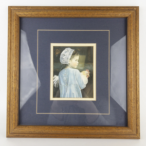 lot 56 image: NANCY NOEL Emma Young Amish Girl with Chicken -Framed