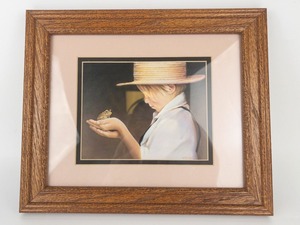 lot 65 image: NANCY NOEL Ian & The Frog Young Amish Boy with Frog -Framed