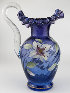 lot 75 image: FENTON Museum Collection 9 38oz Crimped Mulberry Spinal Optic Pitcher with Iced Gold Band. Floral & Butterfly, Handpainted by T. Gaskins. Signed George W Fenton.