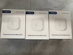 2 Aqara Temperature and Humidity Sensors