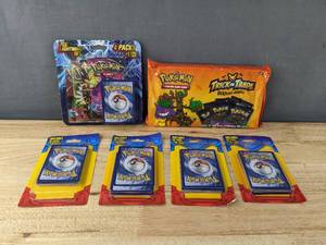 lot 12 image: Brand New Pokemon Trick or Trade, TCG Lightning Set, and 4 Packs of Pokemon 20 Cards I