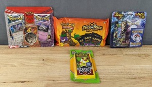 lot 1A image: 4 Brand New Pokemon Trick or Trading, Lightning Set, TCG, and Mystery Pack I