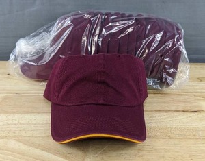 lot 191A image: 24 Brand New Advantage Series Ltd. Maroon with Athletic Gold Hats OSFM A