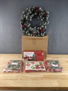 lot 233 image: Assortment of Christmas Items - Pre-lit Wreath, 4 Pillow Covers, 72 Small Gift Bags, Pair of 6-Foot Garlands N