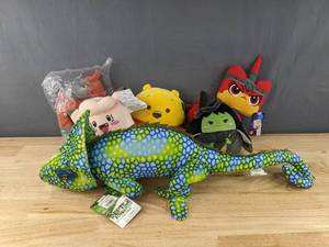 lot 138C image: 6 New Assorted Plush Animals - Squishmallows, Pokemon, Lego Movie Angry Kitty, Adventure Planet, Jurassic World B