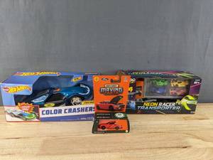 lot 215A image: 3 Brand New Toy Car Sets Matchbox Moving Parts 2024 Ford Mustang, Go Play Neon Racer Transporter, Hot Wheels Color Crashers Cyber Speeder B