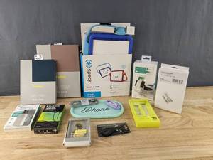 lot 843A image: Brand New Electronics, Cases and Accessories MyTech Power Bank, Mophie Wireless Charging Base, Skullcandy Wireless Earbuds, All In Motion Watch Band, Speck iPad Case and More N