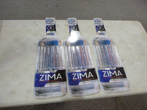 lot 52 image: 3 Zima Tin Signs