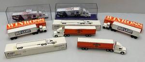 lot 160 image: Misc. Collectible Die-Cast Miniature Semi Trucks (Most NIB)