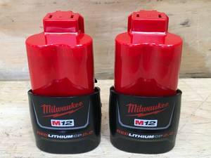 lot 86 image: Lot of 2 - Milwaukee M12 Red Lithium 2Ah Batteries Model # 48-11-2420