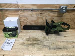 lot 11 image: Green Machine Cordless Chainsaw Model # GMCS6200