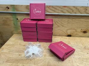 lot 170 image: NUTRIESS Lot of 12-  HatHair Clips