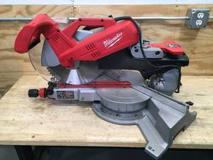 lot 152 image: Milwaukee 12 Sliding Compound Miter Saw Model # 6955-20