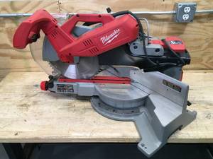lot 153 image: Non-Working Milwaukee 12 Sliding Compound Miter Saw Model # 6955-20