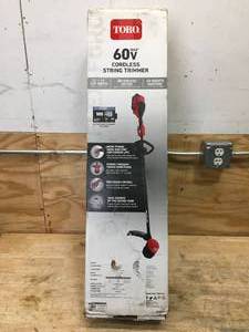 lot 29 image: Toro 60V Cordless String Trimmer With 2Ah Battery And Charger Model # 51831