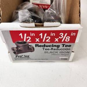 lot 11 image: New Proline Reducing Tee Black Iron 12 x 12 x 38 Qty 5