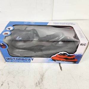 lot 45 image: New Black Motorboat High Speed Water Surfer RC