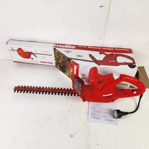 lot 52 image: Homelite Model UT44110E 12 Electric Hedge Trimmer Open Box