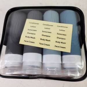 lot 59 image: Lot Of Four 3 Ounce Toiletry Travel Bottles With Zipper Bag NEW