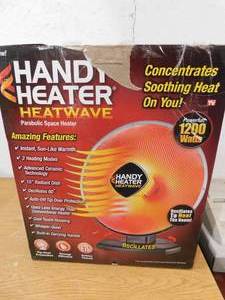 lot 40 image: HANDY HEATER 1200-Watt Electric Ceramic Parabolic Space Heater