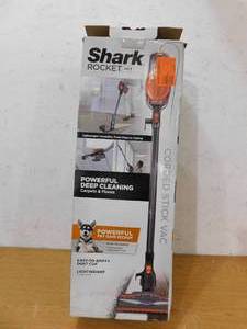 lot 69 image: Shark Rocket Bagless Corded Stick Vacuum for Hard Floors and Area Rugs with Powerful Pet Hair Pickup in Orange