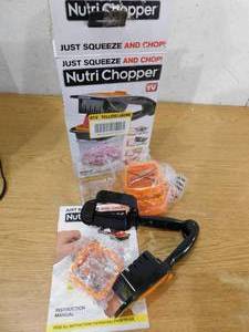 lot 71 image: As Seen on TV Nutri Chopper 5-in-1 Compact Portable Handheld Kitchen Slicer with Storage Container