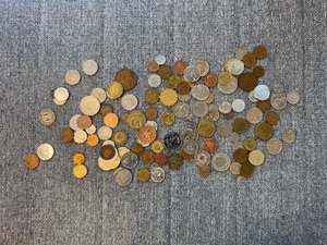 BAG OF FOREIGN COINS