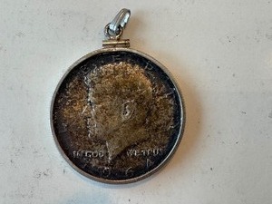 1964 KENNEDY HALF DOLLAR IN CHARM